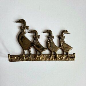 Vintage brass geese family hanging key holder with 5 hooks. Midcentury decor.